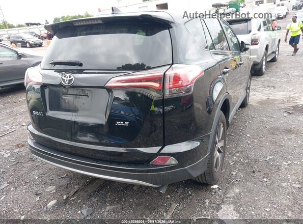 2T3WFREV8JW472316 2018 TOYOTA RAV4 Black Rear right