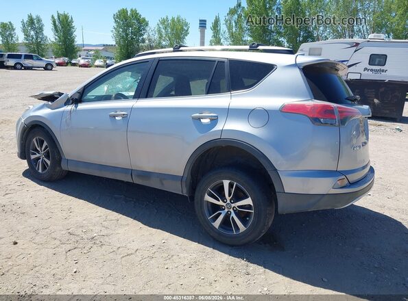 2T3WFREV9GW271288 2016 TOYOTA RAV4 Серебряный Задняя левая четверть
