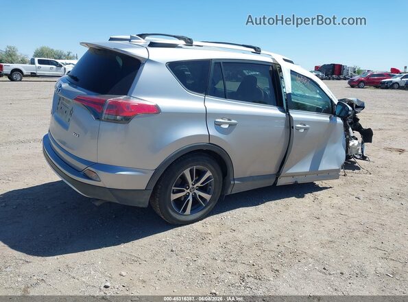 2T3WFREV9GW271288 2016 TOYOTA RAV4 Серебряный Задняя правая четверть