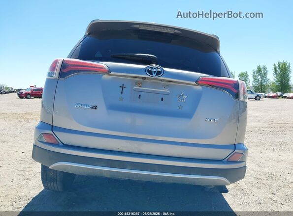 2T3WFREV9GW271288 2016 TOYOTA RAV4 Серебряный 