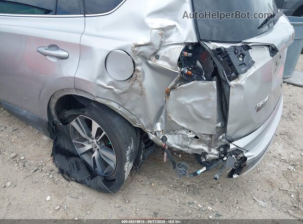 2T3WFREV9GW290651 2016 TOYOTA RAV4 Gray Widok z przodu