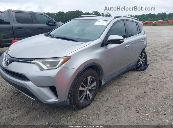 2T3WFREV9GW290651 2016 TOYOTA RAV4 Gray Przód lewy