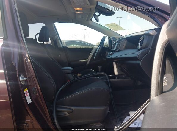 2T3WFREV9JW464127 2018 TOYOTA RAV4 Burgundy Vista interior delantera