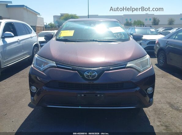 2T3WFREV9JW464127 2018 TOYOTA RAV4 Burgundy Vista interior trasera