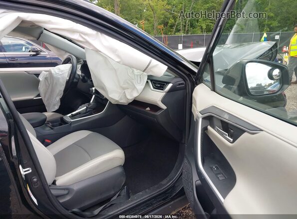 2T3Y1RFV5KW020945 2019 TOYOTA RAV4 Black Front interior view