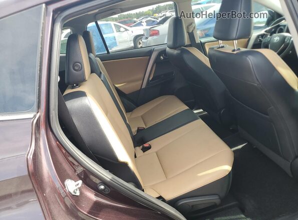 2T3YFREV0GW253951 2016 TOYOTA OTHER Burgundy Rear interior view