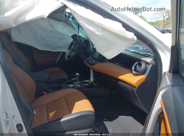 2T3YFREV0GW276761 2016 TOYOTA RAV4 White წინა სალონის ხედი