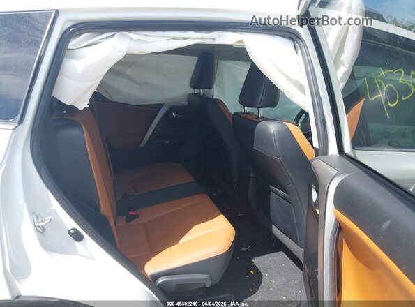 2T3YFREV0GW276761 2016 TOYOTA RAV4 White VIN კოდის სტიკერის ხედი