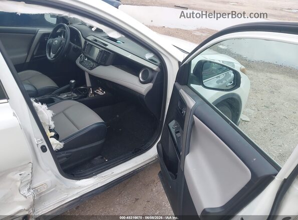 2T3YFREV2HW329641 2017 TOYOTA RAV4 White Front interior view