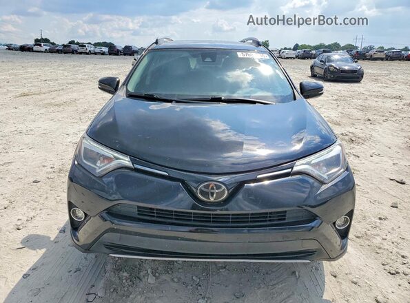 2T3YFREV2JW429714 2018 TOYOTA RAV4 Black Front view