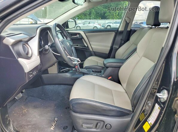 2T3YFREV2JW429714 2018 TOYOTA RAV4 Black Front interior view