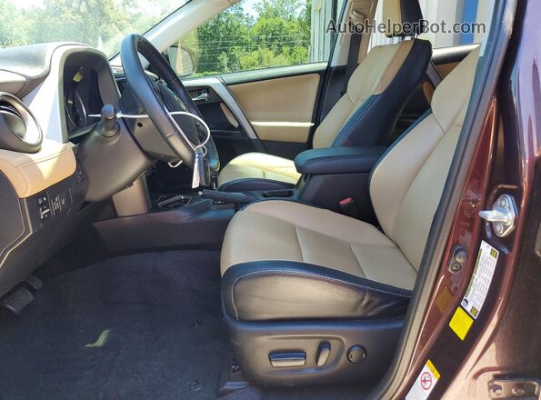 2T3YFREV3GW237078 2016 TOYOTA RAV4 Purple Front interior view
