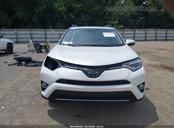2T3YFREV3HW316638 2017 TOYOTA RAV4 White Vista interior trasera