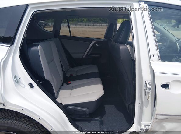 2T3YFREV3HW316638 2017 TOYOTA RAV4 White Vista de la etiqueta del VIN