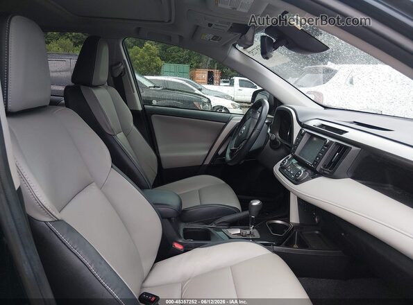 2T3YFREV5JW461654 2018 TOYOTA RAV4 Blue Front interior view