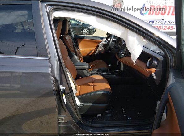 2T3YFREV7GW255986 2016 TOYOTA RAV4 Gray Front interior view