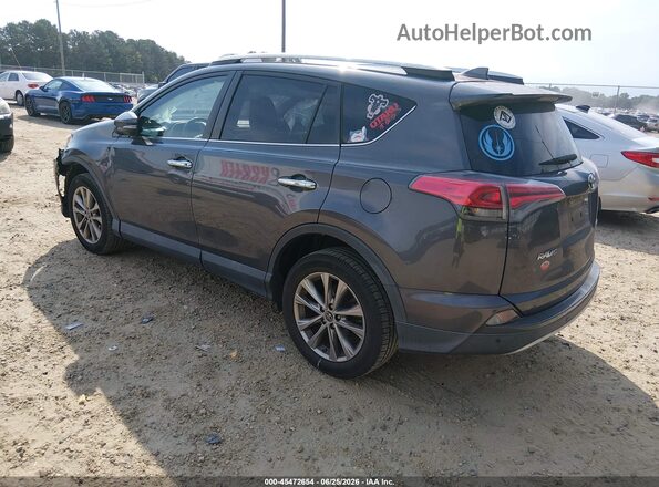 2T3YFREV7GW255986 2016 TOYOTA RAV4 Gray Rear left