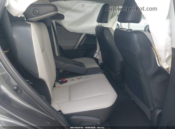 2T3YFREV8JW444394 2018 TOYOTA RAV4 Gray VIN կոդի պիտակի տեսք
