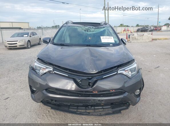 2T3YFREV8JW444394 2018 TOYOTA RAV4 Gray Սարքավորումների վահանակի տեսք