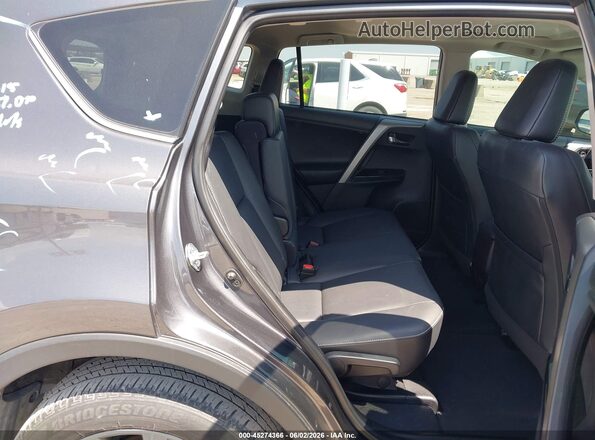 2T3YFREV9JW450818 2018 TOYOTA RAV4 Gray VIN կոդի պիտակի տեսք