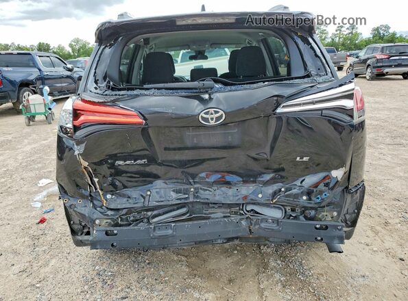 2T3ZFREV0HW338570 2017 TOYOTA RAV4 Black Rear view