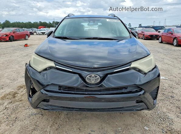 2T3ZFREV0HW338570 2017 TOYOTA RAV4 Black Front view