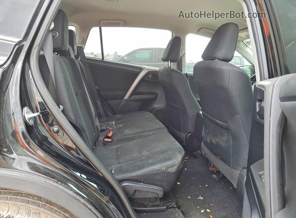 2T3ZFREV0HW338570 2017 TOYOTA RAV4 Black Rear interior view
