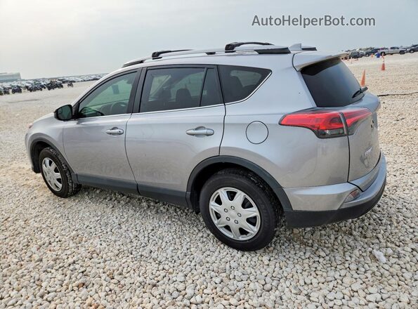 2T3ZFREV0HW351464 2017 TOYOTA RAV4 Gray Rear left