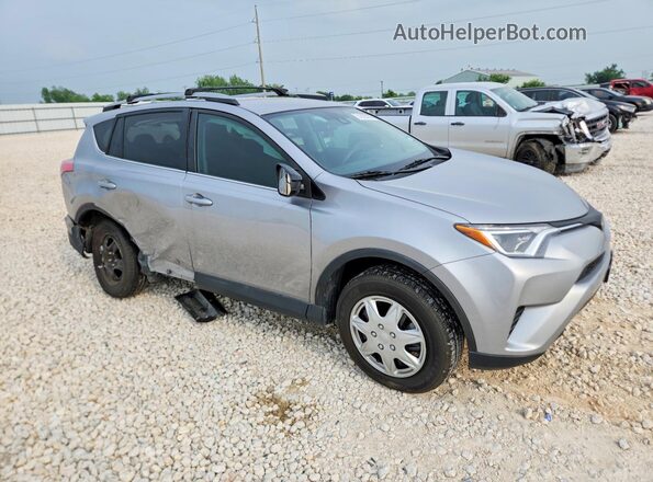 2T3ZFREV0HW351464 2017 TOYOTA RAV4 Gray Front right