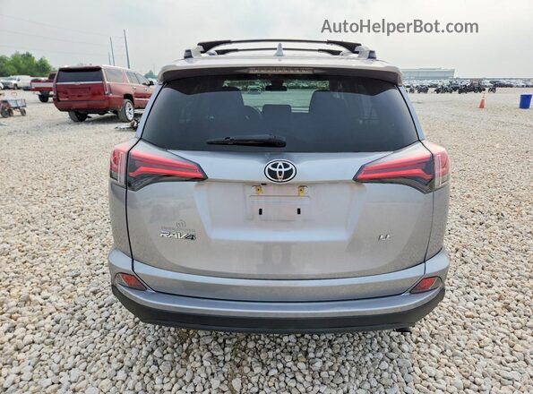 2T3ZFREV0HW351464 2017 TOYOTA RAV4 Gray Rear view