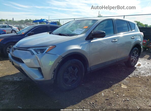 2T3ZFREV0JW466037 2018 TOYOTA RAV4 Silver Vista tres cuartos delantera izquierda