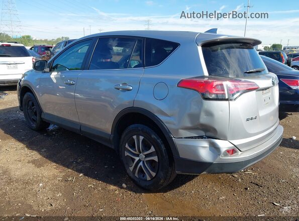 2T3ZFREV0JW466037 2018 TOYOTA RAV4 Silver Trasero izquierdo