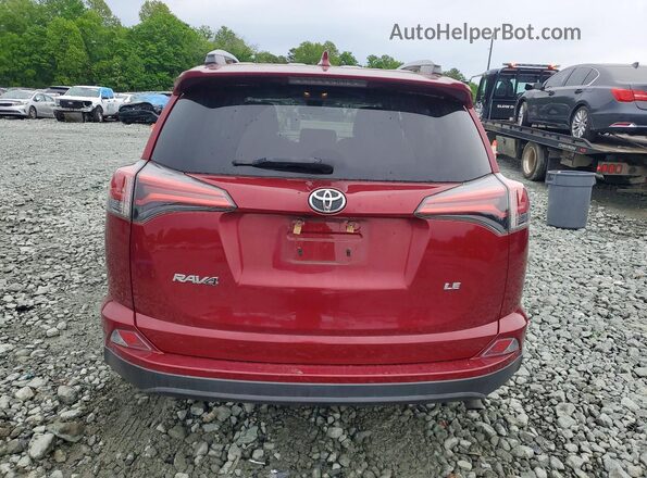 2T3ZFREV0JW470766 2018 TOYOTA RAV4 Burgundy Rear view