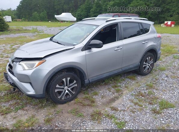2T3ZFREV1GW237973 2016 TOYOTA RAV4 Silver Առջևի ձախ երեք քառորդ տեսարան
