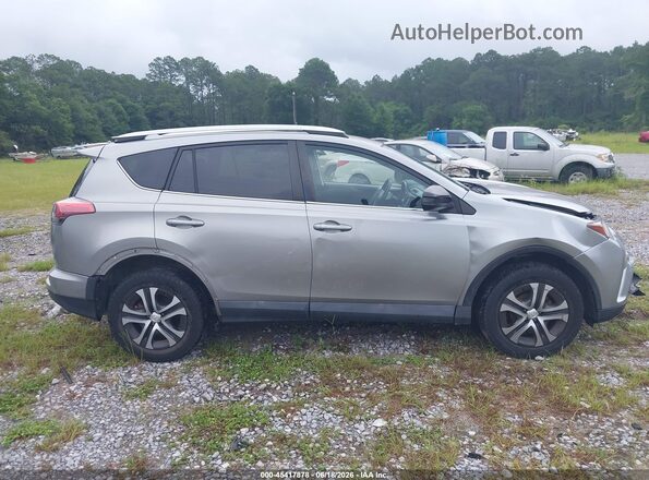 2T3ZFREV1GW237973 2016 TOYOTA RAV4 Silver Սալոնի հետևի տեսք