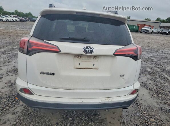 2T3ZFREV1HW317176 2017 TOYOTA RAV4 White Rear view