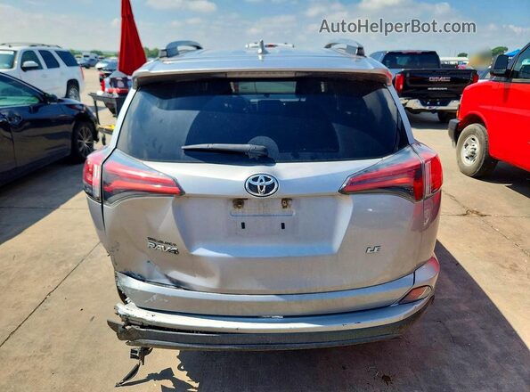 2T3ZFREV1HW368676 2017 TOYOTA RAV4 Silver Widok z tyłu