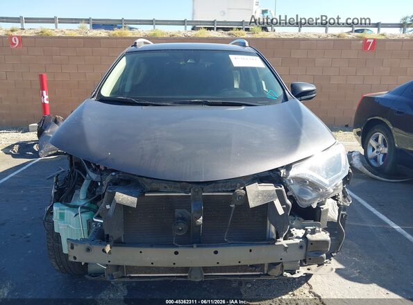 2T3ZFREV1JW516640 2018 TOYOTA RAV4 Gray Вид задньої частини салону