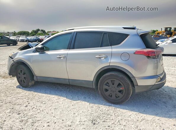 2T3ZFREV2GW237836 2016 TOYOTA RAV4 Silver Rear left
