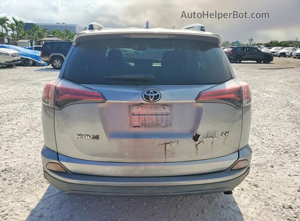 2T3ZFREV2GW237836 2016 TOYOTA RAV4 Silver Rear view