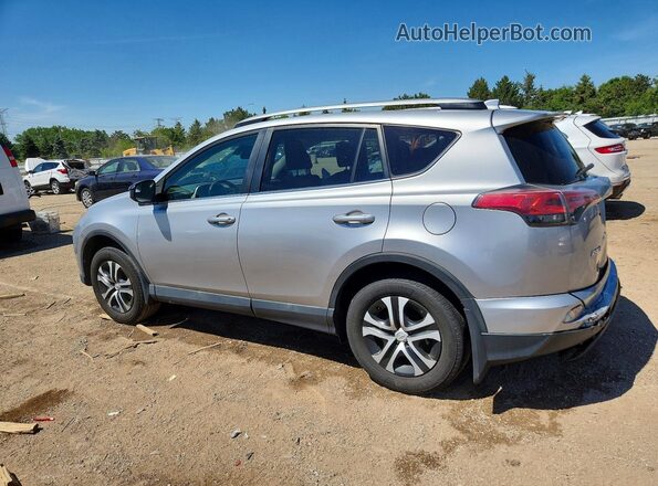 2T3ZFREV2HW345441 2017 TOYOTA RAV4 Silver Trasero izquierdo