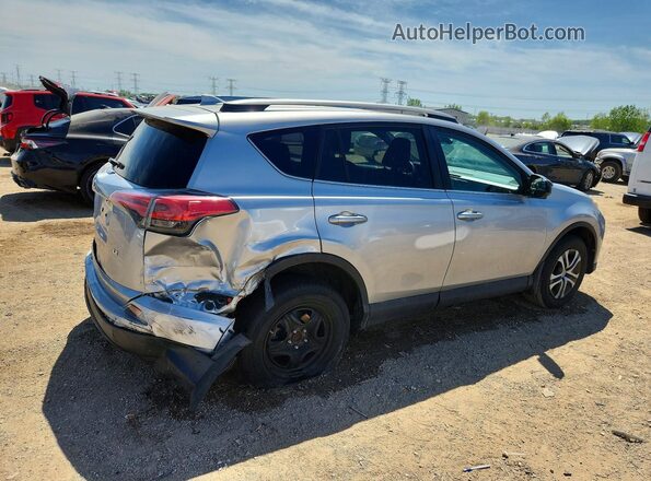 2T3ZFREV2HW345441 2017 TOYOTA RAV4 Silver Trasero derecho