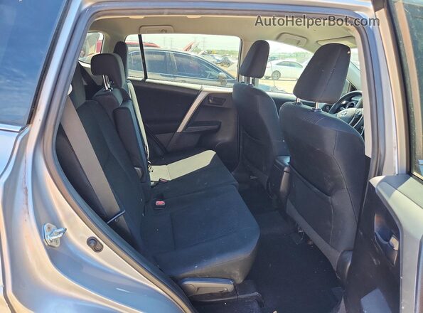 2T3ZFREV2HW345441 2017 TOYOTA RAV4 Silver Vista de los asientos traseros