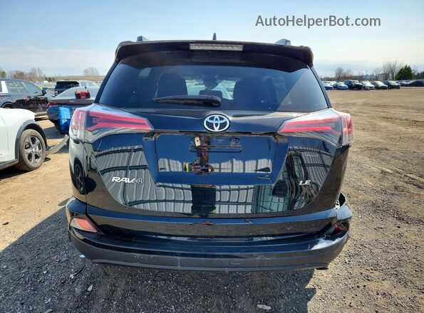 2T3ZFREV2HW397359 2017 TOYOTA RAV4 Black Вид ззаду