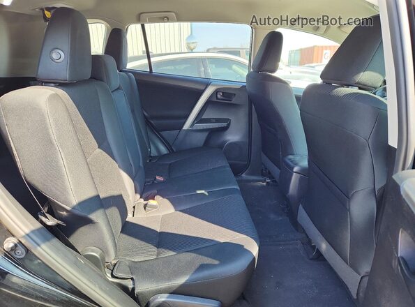 2T3ZFREV2HW397359 2017 TOYOTA RAV4 Black Вид задньої частини салону