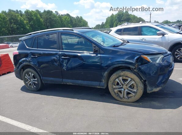 2T3ZFREV2JW493837 2018 TOYOTA RAV4 Dark Blue Rear interior view