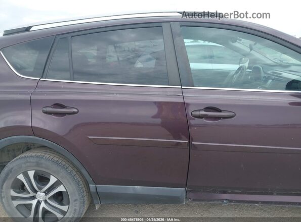2T3ZFREV3GW267914 2016 TOYOTA RAV4 Burgundy Vista interior trasera