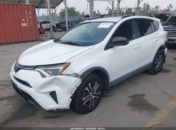 2T3ZFREV3JW438989 2018 TOYOTA RAV4 White 