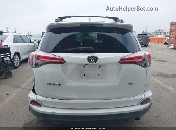 2T3ZFREV3JW438989 2018 TOYOTA RAV4 White 