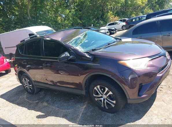 2T3ZFREV3JW439429 2018 TOYOTA RAV4 Фиолетовый Вид задней части салона
